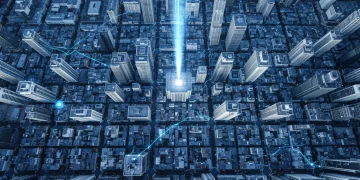 Aerial view of a futuristic city at dawn, overlaid with glowing blue financial data streams and market trends, representing the connection between news and investment strategy.